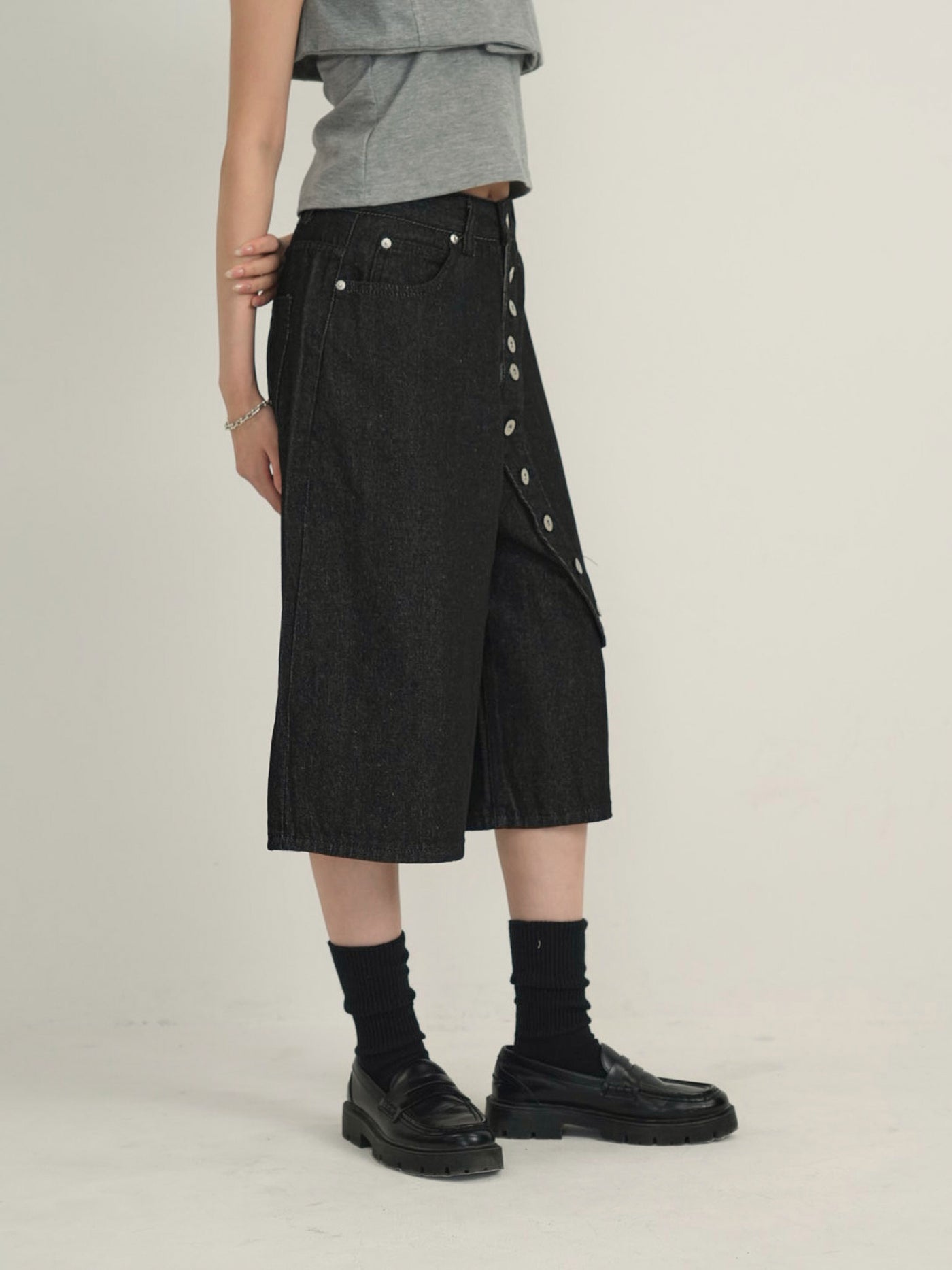 asymmetry button half denim pants