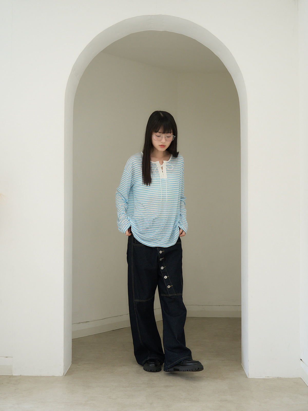 asymmetry button denim pants