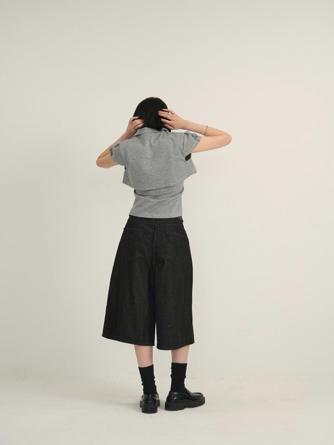asymmetry button half denim pants