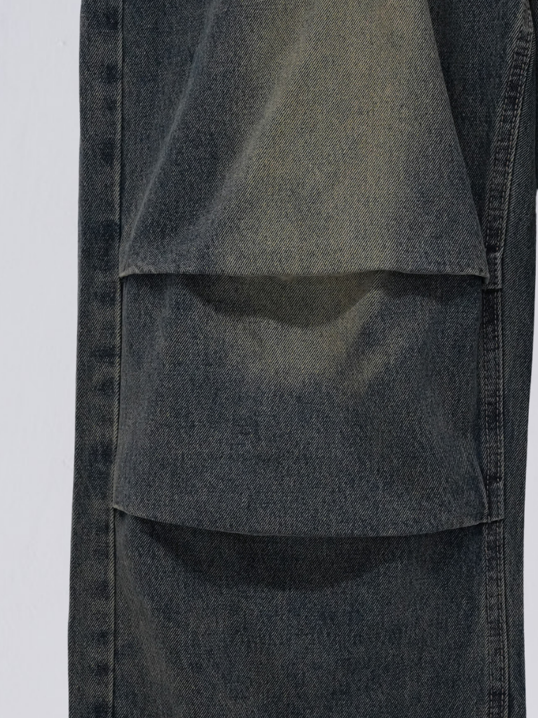 knee tuck denim