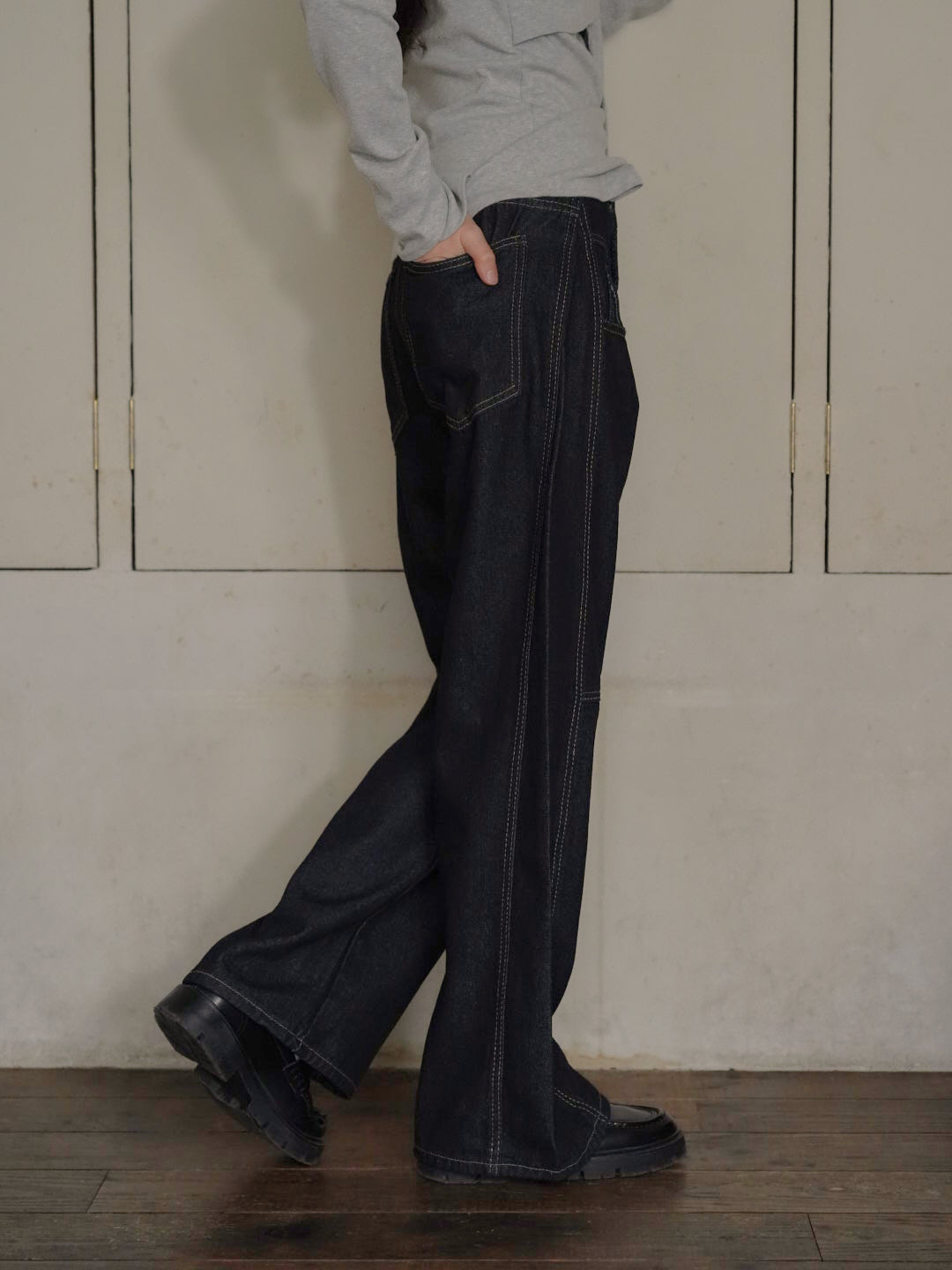 asymmetry button denim pants