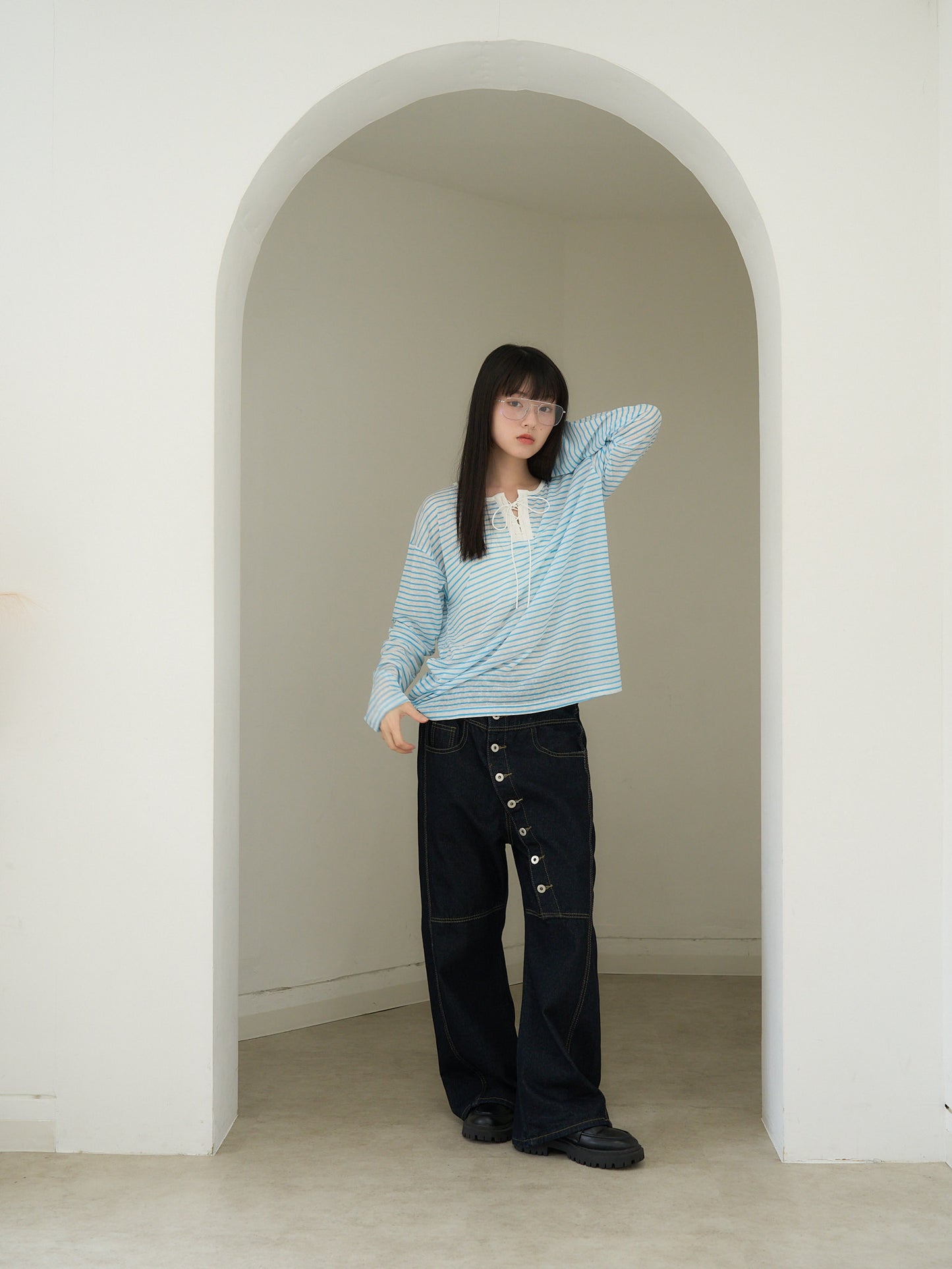 asymmetry button denim pants