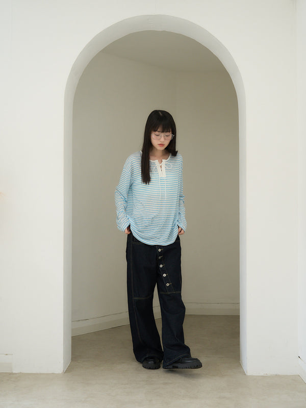 asymmetry button denim pants