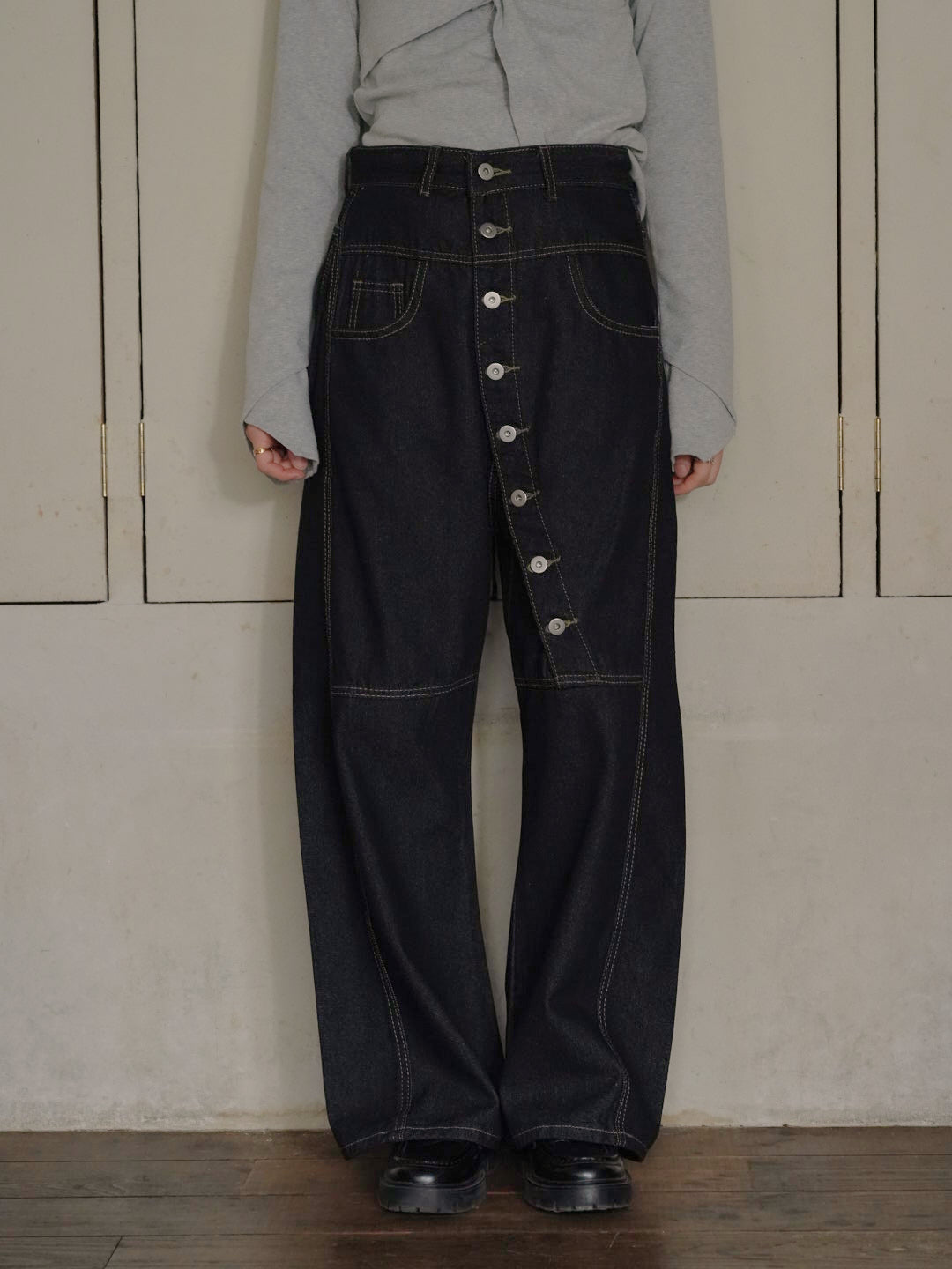 asymmetry button denim pants
