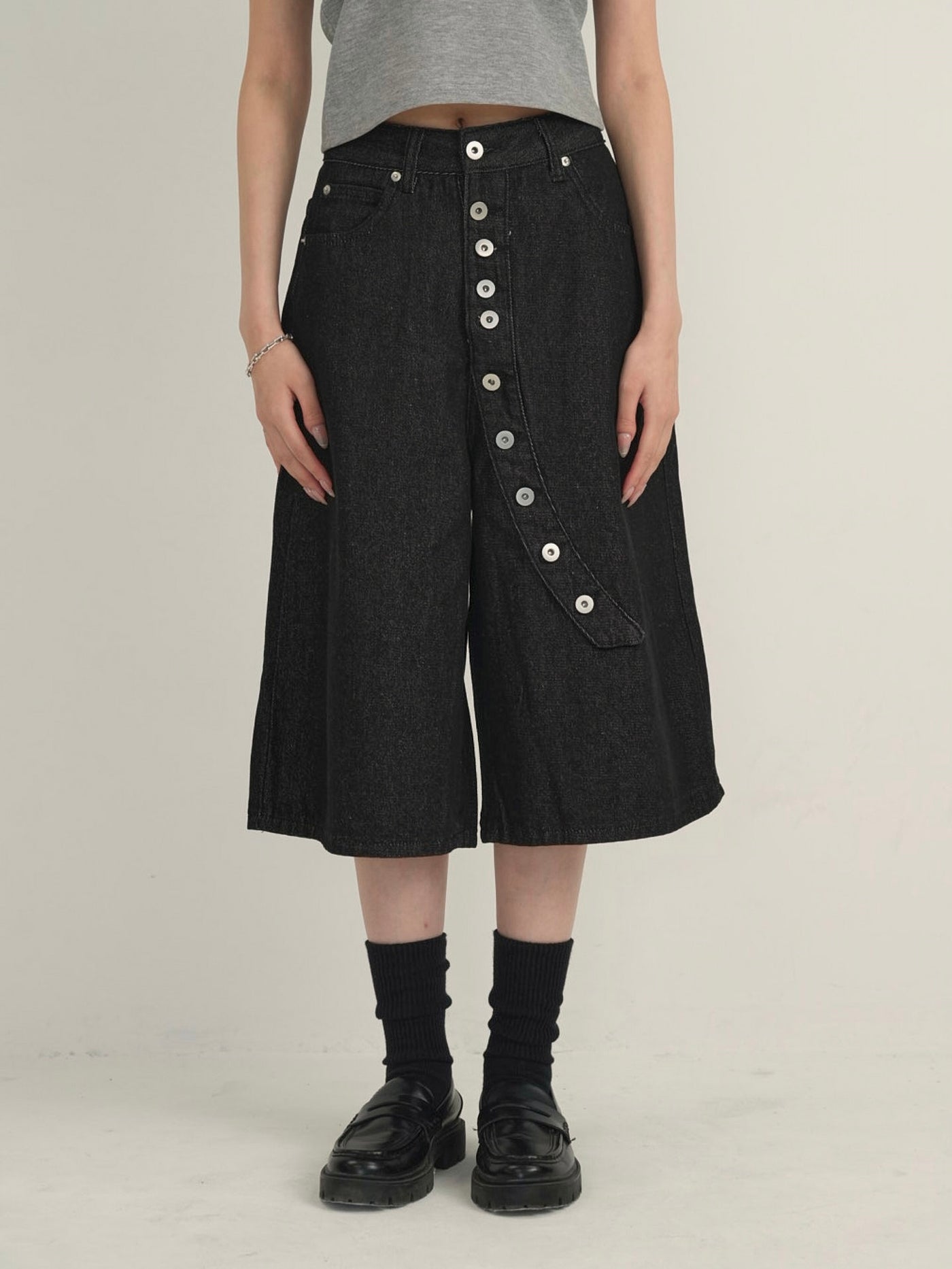 asymmetry button half denim pants