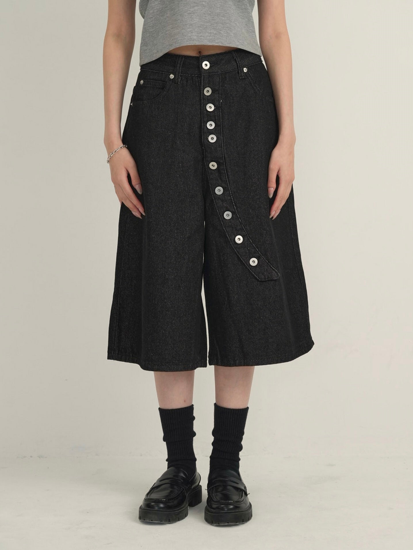 asymmetry button half denim pants