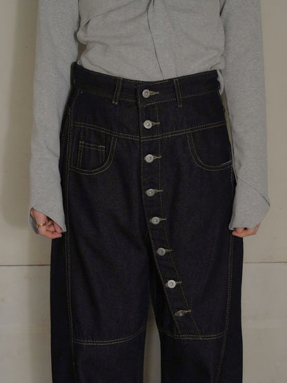 asymmetry button denim pants