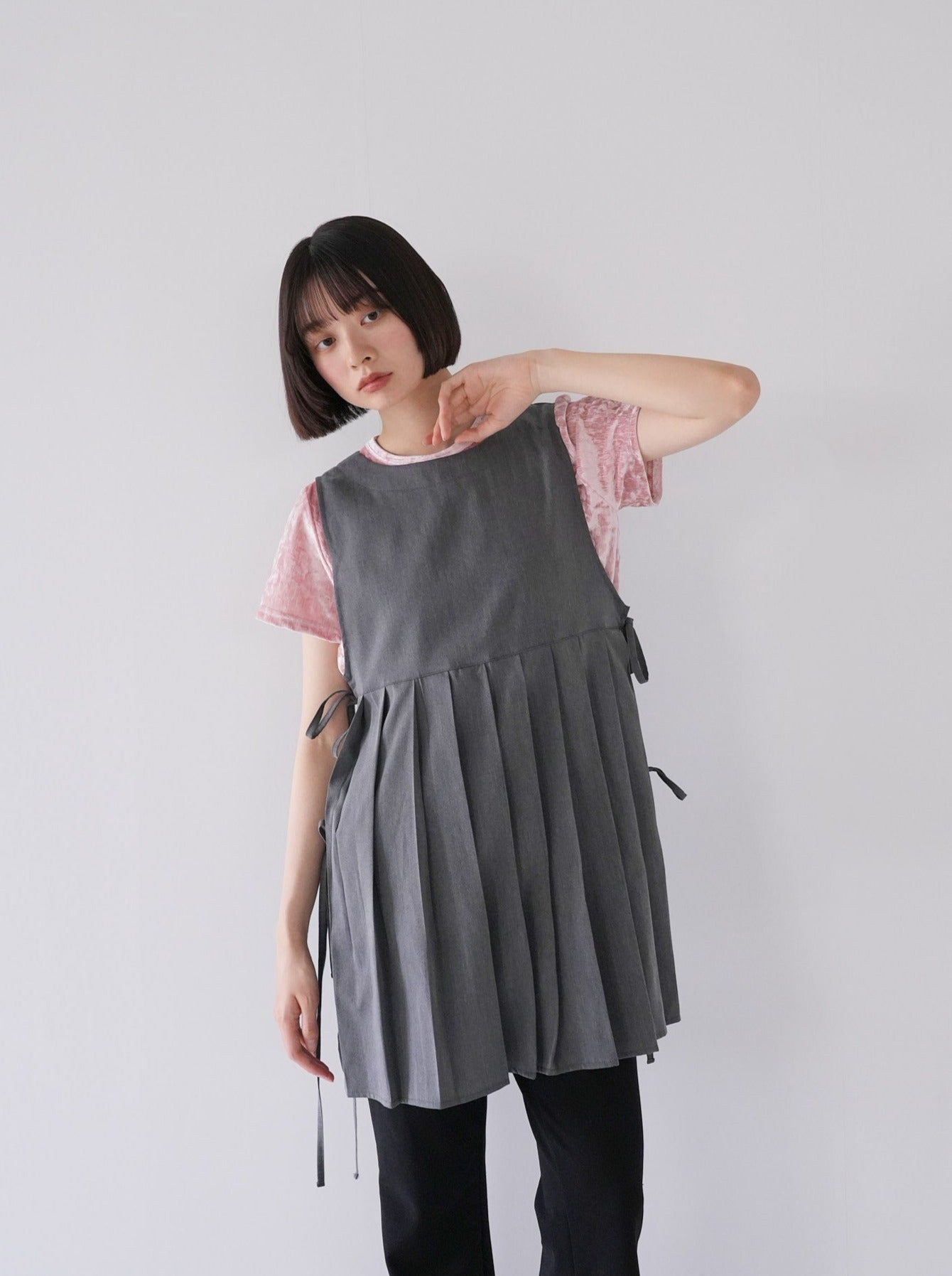 sleeveless pleated vest