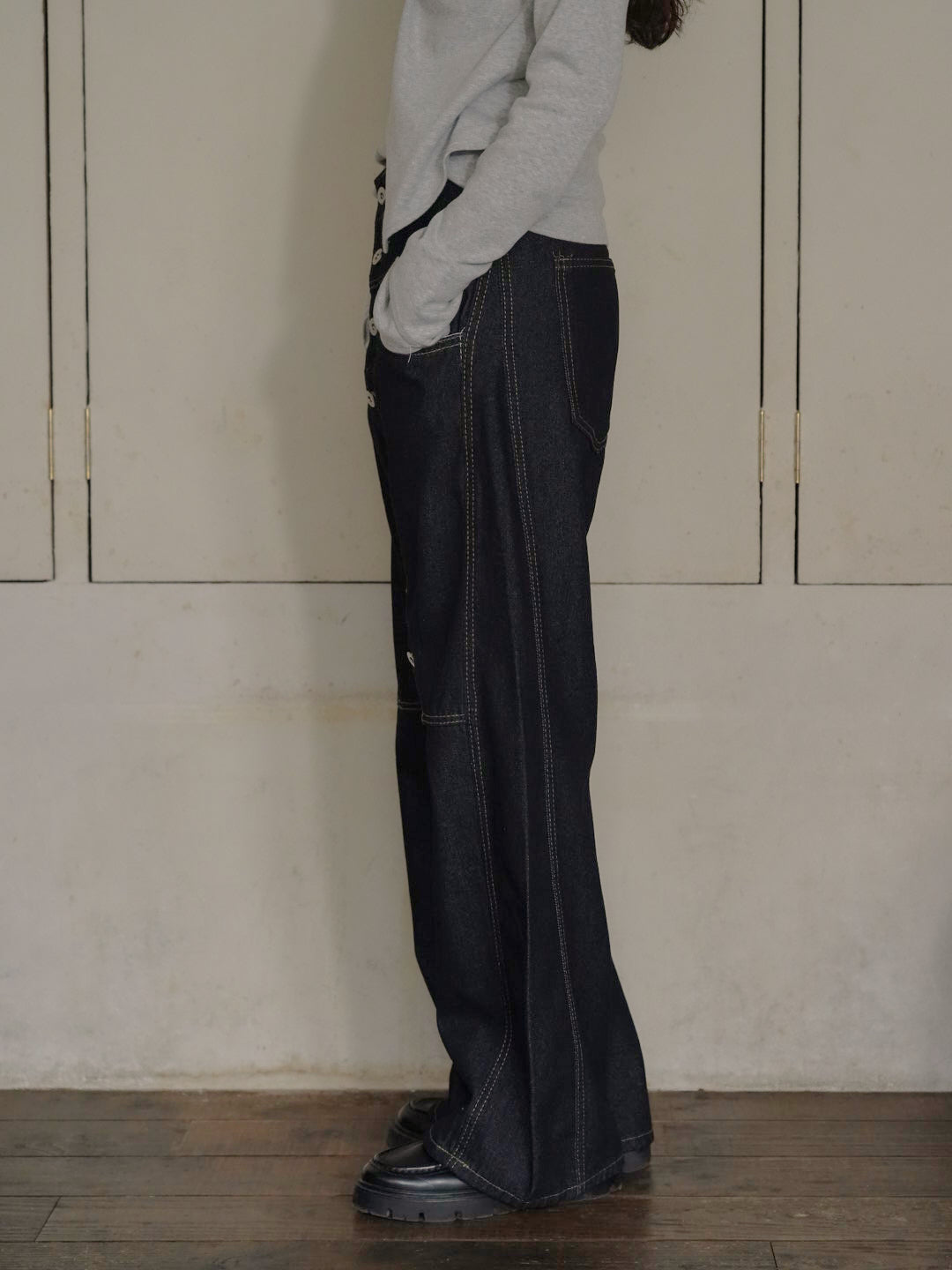 asymmetry button denim pants