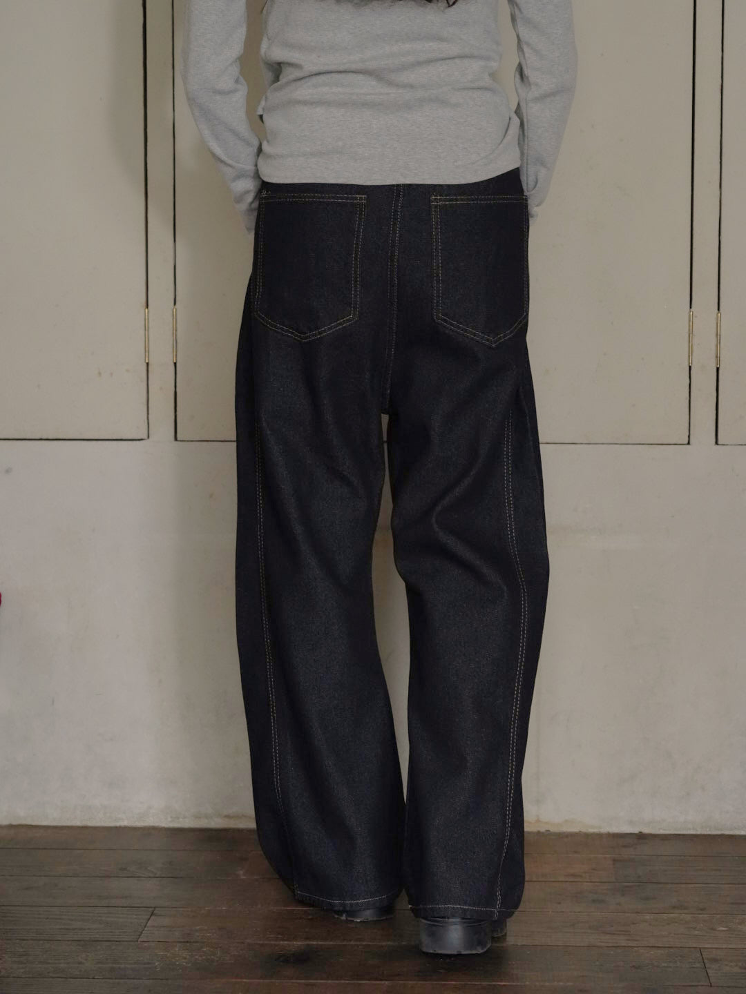 asymmetry button denim pants